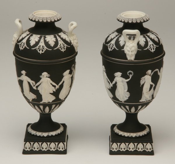 Pair of Wedgewood Jasperware urns: Pair of Jasperware urns with dancing maidens, marked Wedgewood, 9"h.