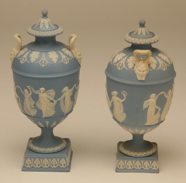 Pair of Wedgewood Jasperware lidded urns: Pair of Jasperware lidded urns with dancing maidens, marked Wedgewood, 9.5"h.