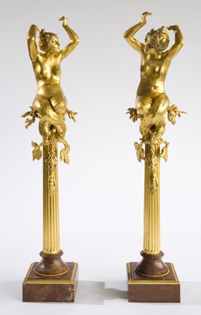 Pair of early 20th c. bronze maiden sculptures: Pair of early 20th century dore' bronze maidens perched on fluted columns supported by a rouge marble base, 65"h.
