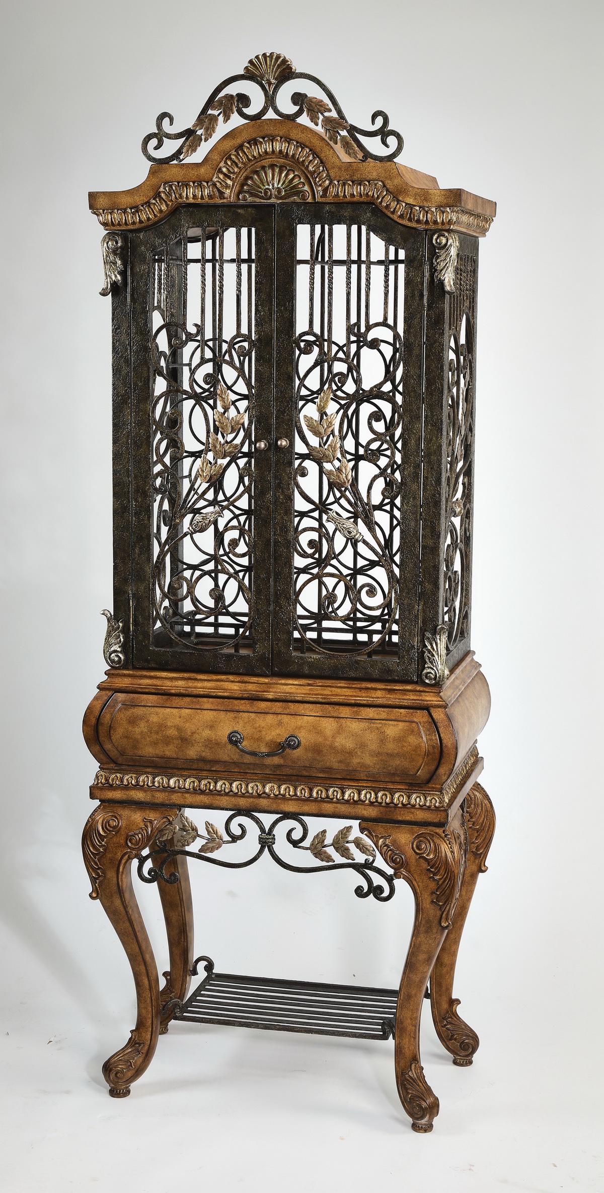 Maitland Smith style wine cabinet, 82"h: Maitland Smith style wine cabinet in the Louis XV taste, in the form of an aviary on stand, executed in patinated metal and burled wood, having a chapeau gendarme pediment over a metal cage opening to