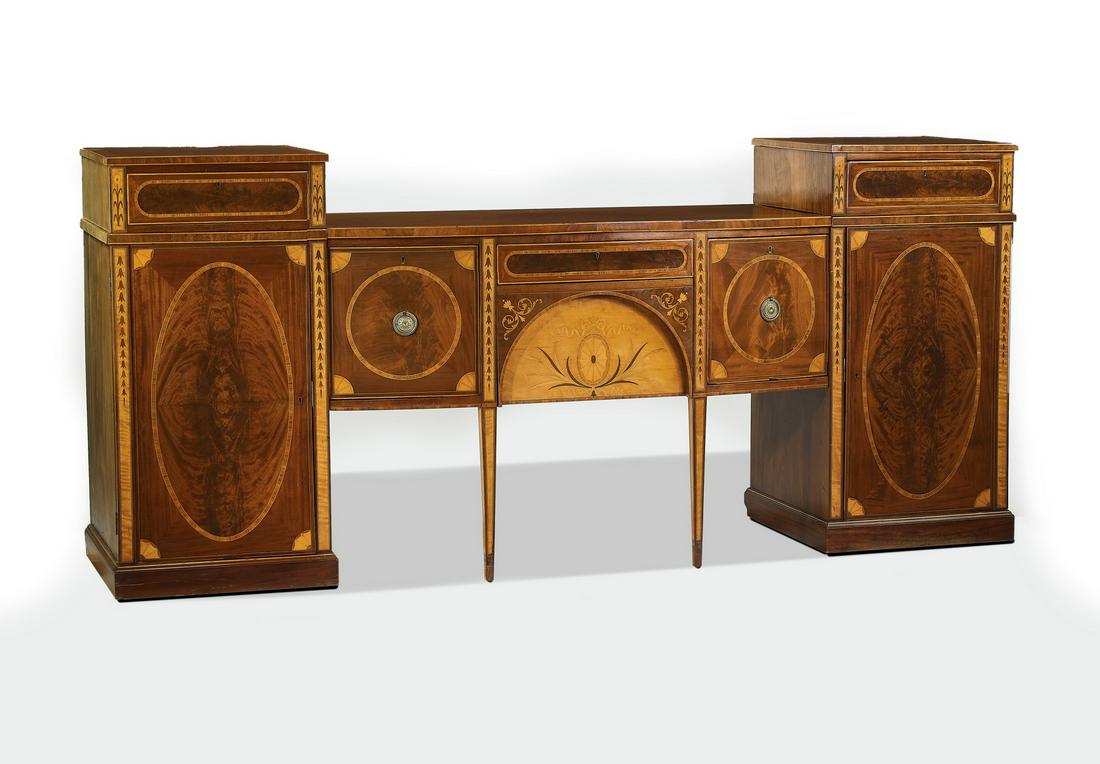 Hepplewhite style mahogany marquetry sideboard, 86"w: Hepplewhite style marquetry sideboard, early 20th century, executed in mahogany, satinwood, and flame mahogany, having a rectangular surface flanked by long drawers, the stiles inlaid with foliates, s