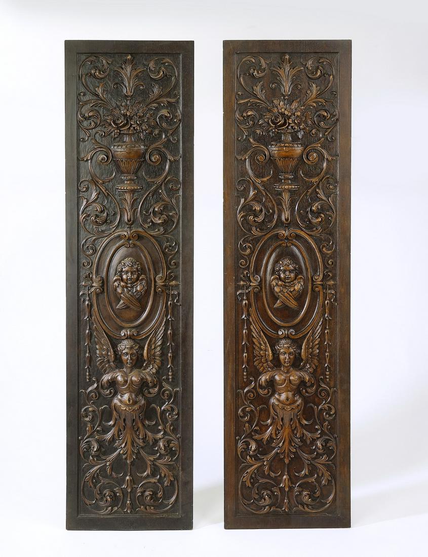 (2) Baroque style architectural panels, 51"h: Pair of Baroque style architectural panels, crafted of cast composition, each depicting an elaborate floral arrangement above a putto medallion, rising on a winged term figure, the whole centered in a