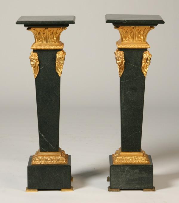 Pair of marble pedestals: Pair of bronze mounted verde marble tapering pedestals with dore' bronze maiden masks, 41"h x 13.5" square top.