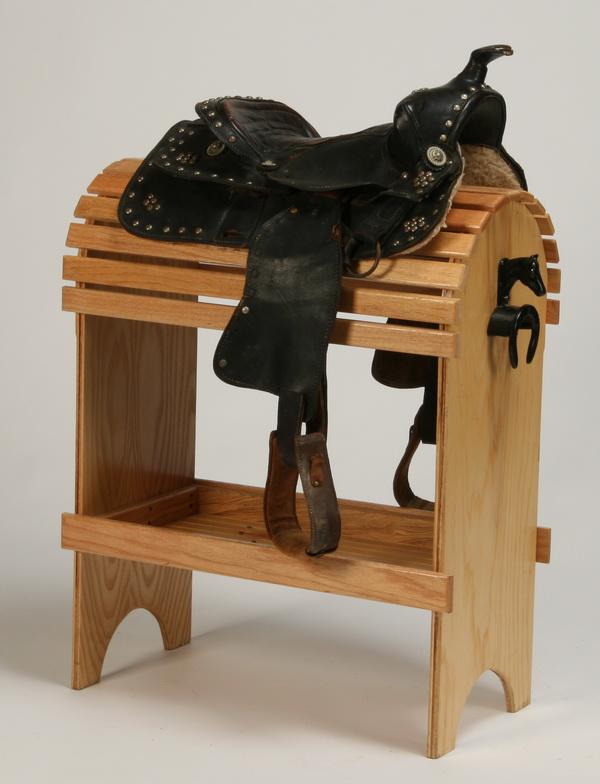 Western saddle: Western saddle in black leather. Display stand NOT included.