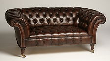 English chesterfield tufted leather loveseat