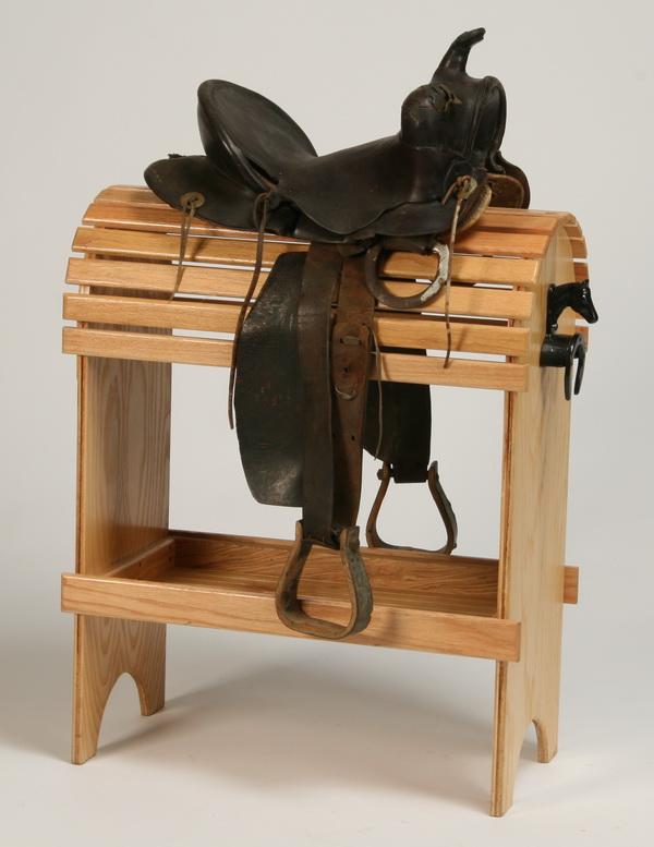 Western saddle: Western saddle in black leather. Display stand NOT included.