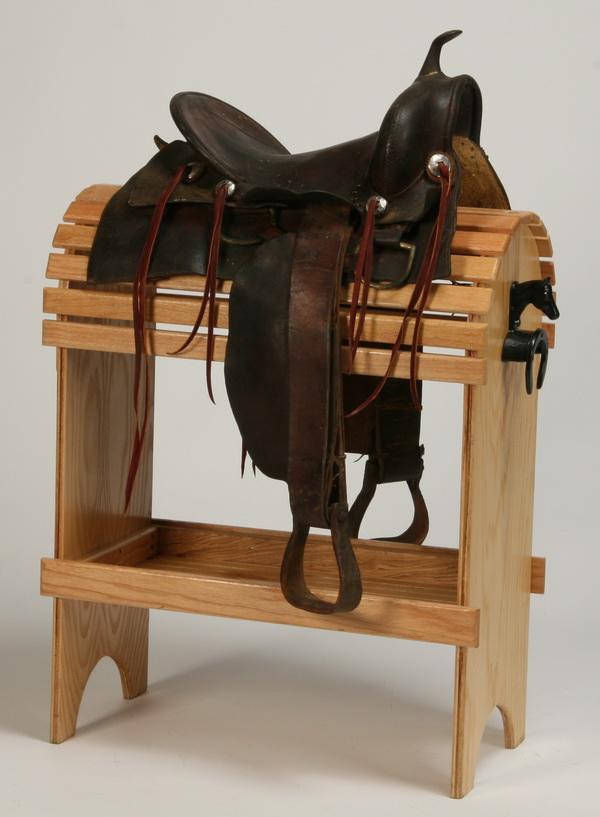 Western saddle: Western saddle in black leather. Display stand NOT included.