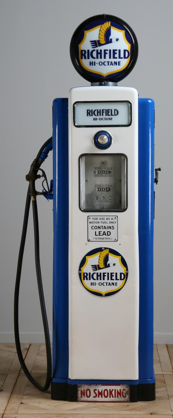 Vintage gas pump by Wayne Pump Company: Vintage American gas pump, maker marked Wayne Pump Co. Model #70-C, c. 1940's, with the Richfield Hi-Octane brand logo, and a Richfield Hi-Octane brand globe, 89"h x 24"w x 15"d at the base.