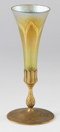 Tiffany Studios trumpet vase: Tiffany gold iridescent feather design favrile glass trumpet vase, marked "L.C.T.", with dore' bronze base, marked "Tiffany Studios, New York 1043", 11.5" tall.