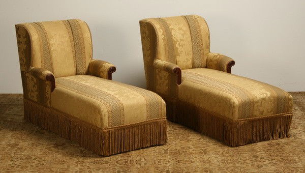 Pair of English chaises: Pair of English chaises upholstered in golden damask with bullion fringe, 34"h x 58"l x 28"w.