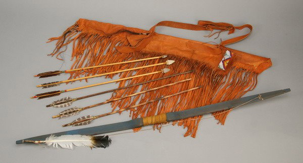 20th c. Native American Indian quiver w/ bow: 20th century Native American Indian hand crafted quiver, bow and six arrows with stone arrowheads, 47"l.
