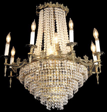 19th c. French bronze and crystal chandelier: Late 19th century French 8-light reticulated dore' bronze and crystal chandelier with tiered and cascading prisms, 34"h x 21"w.