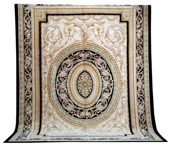 Aubusson style wool rug: Aubusson style wool rug with central medallion and black border, 10' wide x 13' 10" long.