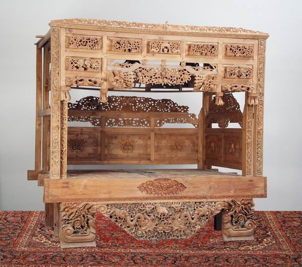 Early 20th c. carved Burmese canopy bed: Late 19th or early 20th century Burmese carved teakwood canopy bed with pierce carved panels depicting birds, flowers and dragons, 97"h x 103"w x 58"d.