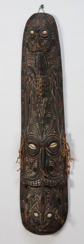 Oversized hand carved totem mask: Oversized hand carved totem mask from the Sepik River region of New Guinea, 45"h x 10"w.