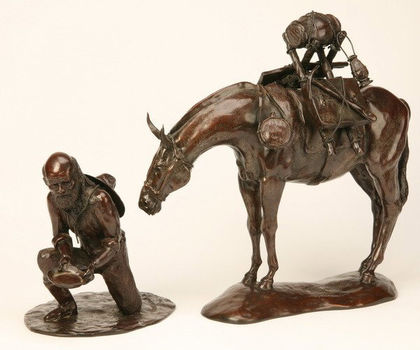 Contemporary bronze sculpture, artist signed: Contemporary bronze sculpture depicting a gold miner with pack mule, artist signed and dated, Bruce B. Everly, Sr, 2002; mule 20"h x 21"l x 7"w; miner 12"h x 11"l x 9"w.