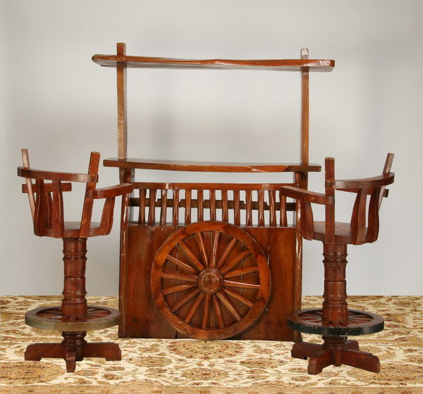 Western wagon wheel style 3-piece bar: Western wagon wheel inspired three piece home size bar, 2 bar stools and bar. Bar size 75"h x 62"l.