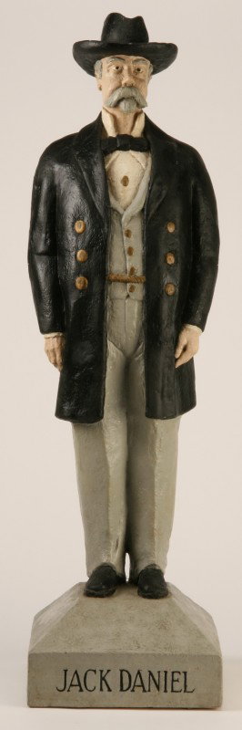Papier mache' advertising sculpture: Early 20th century American papier mache' sculpture of a southern gentleman advertising Jack Daniel's whiskey, 34"h x 9.5"w x 10"d at the base.