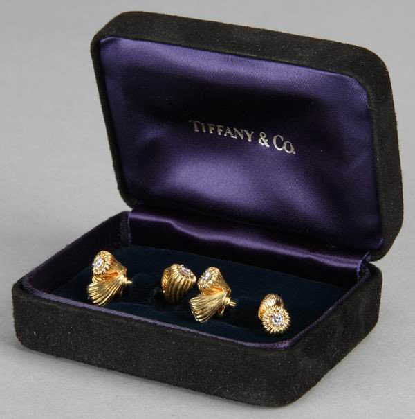 Tiffany & Co. Schlumberger gold cufflinks: Pair of Jean Schlumberger for Tiffany & Co. 18kt gold and diamond cufflinks, maker marked, with original box.