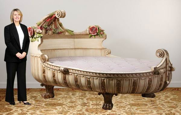 Rare early 20th c. Venetian gondola bed: Unique and rare early 20th c. carved and polychrome decorated Venetian gondola bed, including custom tufted mattress; headboard 61"h, footboard 37"h, overall size 103"l x 72"w.