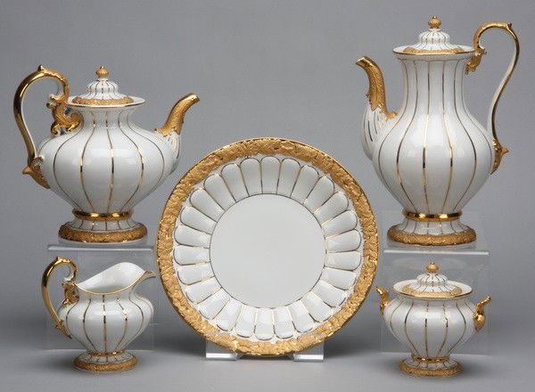 5-piece Meissen coffee service, marked: Late 19th or early 20th century 5-piece Meissen tea and coffee set. Includes (1) teapot with lid, (1) coffee pot with lid, (1) creamer, (1) sugar bowl, and (1) serving plate, maker marked.
