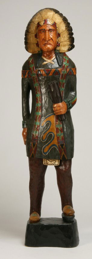 Hand carved and decorated cigar store Indian: 20th century hand carved wood and polychrome decorated cigar store Indian, 73"h x 15"w at the base.