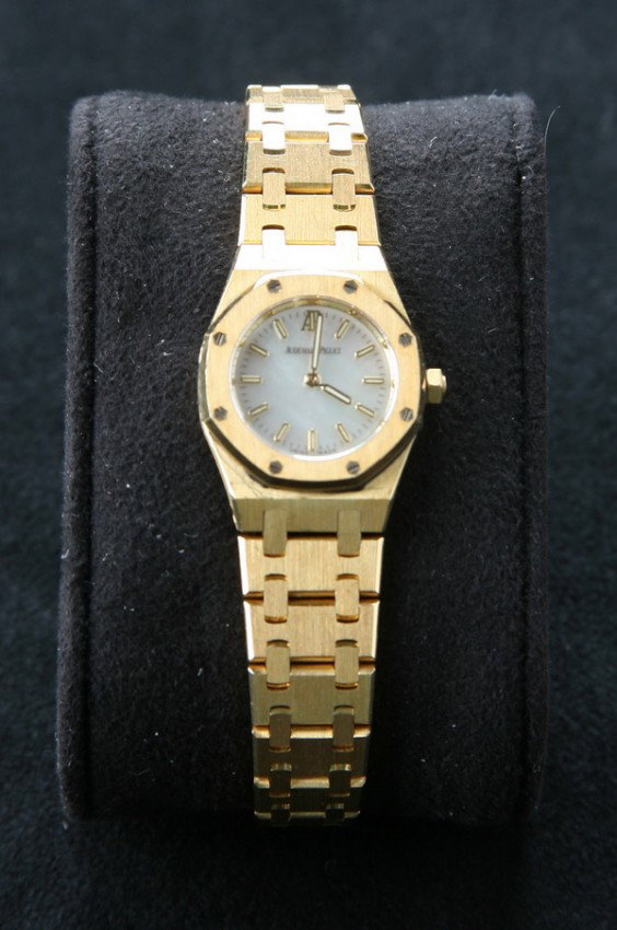Audemars Piguet Royal Oak 18kt gold watch: Audemars Piguet Royal Oak No. 101 ladies' 18kt yellow gold watch and bracelet, with rare mother-of-pearl face, serial # 90964.