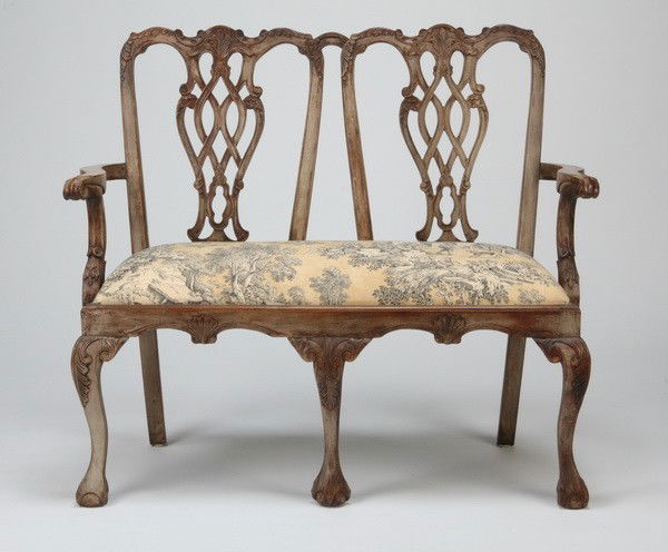 20th c. Chippendale-style settee: 20th century Chippendale-style carved mahogany settee in a gray wash finish, 41"h x 46"l x 22"d.