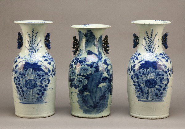 (3) Early 20th c. Chinese porcelain vases: Group of three early 20th century Chinese export porcelain vases hand decorated with blue and white floral designs, 17"h.