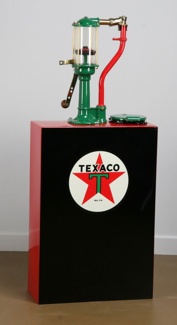 Vintage Texaco hand cranked oil dispenser: Rare gas station hand cranked pump oil dispenser, circa 1920's-1930's, with the Texaco brand logo, 52"h x 22"l x 10"d.