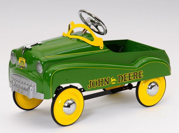 Late 20th c.1950's style John Deere pedal car: Late 20th century 1950's style child's pedal car with the John Deere brand logo, 22"h x 35"l x 14"w.