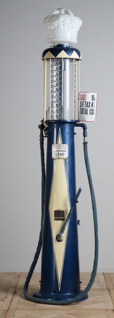 Vintage gas pump by Wayne Manufacturing: Vintage American gas pump by Wayne Manufacturing Co., Model 665 with molded milk glass crown, 118"h x 24" diameter base.