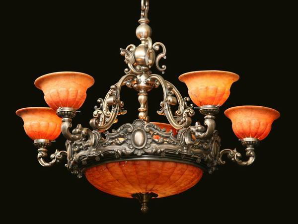 Early 20th c. bronze and alabaster chandelier: Early 20th century silver over bronze 5 arm Rococo-style chandelier with alabaster shades and central dome, 34"h x 39"w.