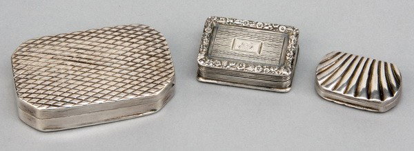 (3) 18th c. sterling silver vinaigrettes: Grouping of 3 late 18th or early 19th century sterling silver vinaigrettes ranging in width from 1 1/8" to 2". Includes (1) with cross-hatch design, maker marked "W"; (1) decorated with floral border 