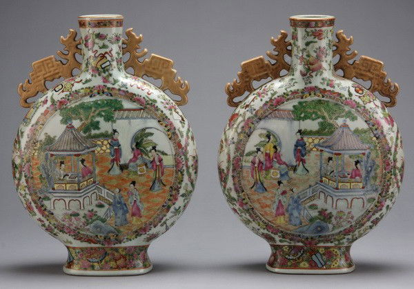 (2) Early 20th c. Rose Famille moon flasks: Pair of early 20th century Chinese export porcelain hand decorated Rose Famille moon flasks, 17.5" h x 13" diameter.