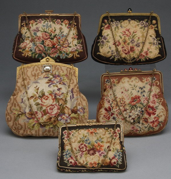(5) 19th c. ladies' petite point purses: Grouping of 5 late 19th or early 20th century petite point purses depicting floral bouquets, one with interior tag that reads, "Made in Vienna Austria for John Wanamaker, Philadelphia," ranging in hei