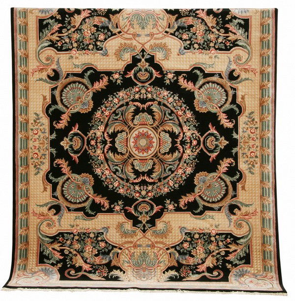 Hand knotted Indo Persian area rug: Hand knotted 100% wool Indo Persian area rug with a cream and navy ground accented by shell and arabesque designs in shades of rose and blue, 11' 11" l x 9' 2" w.