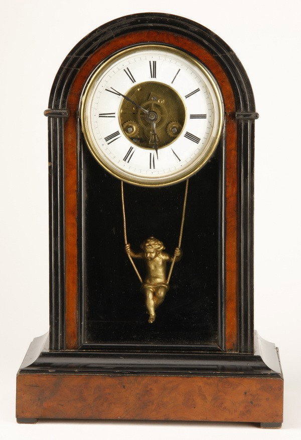 19th c. French mantle clock: Rare late 19th century French clock with exposed escapement, the dore' bronze pendulum in the form of a finely chased cherub on swing, the mechanism maker marked "Japy Freres, Echappement Breve 38-427