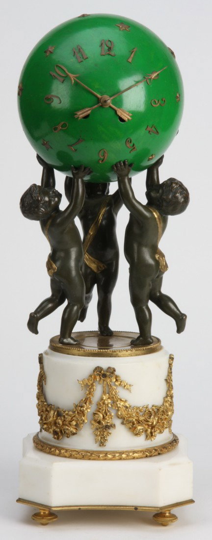19th c. bronze and marble figural clock: 19th century Louis XV style dore' and patinated bronze clock in the form of three cherubs holding a sphere shaped clock, on a Thassos marble base with finely chased bronze floral swags, 20"h x 7"w x 7