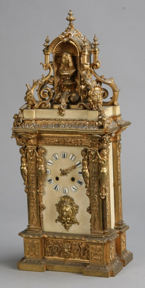 19th c. dore' bronze and marble clock: 19th century dore' bronze and marble figural cartel clock, with finely chased bronze mounts featuring a niche with a bust of royalty on pedestal surrounded by Northwind masks and nymph shaped term fig