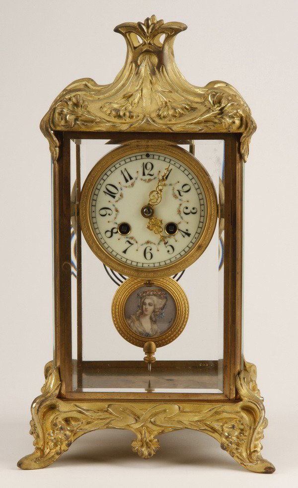 19th c. Art Nouveau crystal regulator clock: Rare late 19th century French Art Nouveau dore' bronze crystal regulator clock, the porcelain clock face with enameled floral garlands, and the gilt bronze pendulum with a portrait of a young maiden p