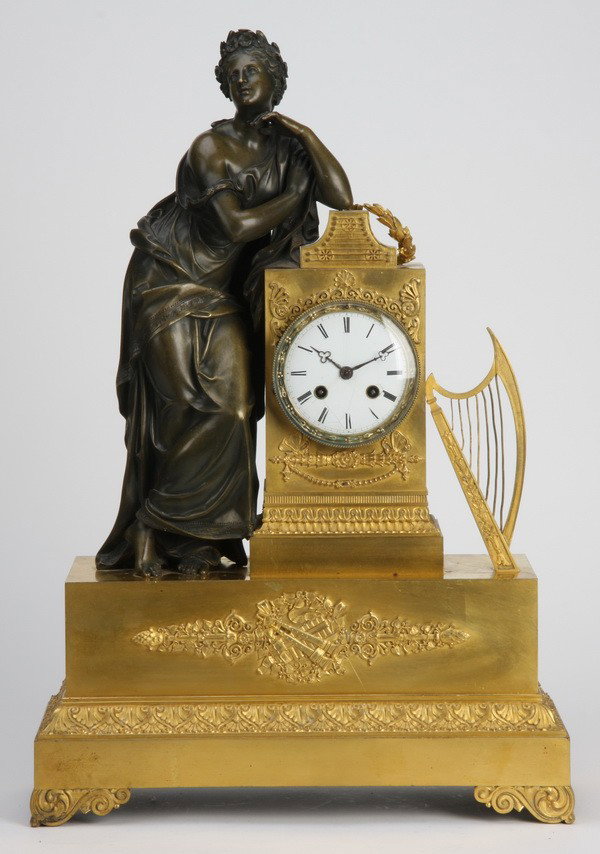 19th c. French bronze figural clock: 19th century French Empire patinated and dore' bronze figural clock depicting a pensive maiden and harp resting against the clock face, the clock mechanism maker marked "Barbot de Paris", 22.5"h x 15"