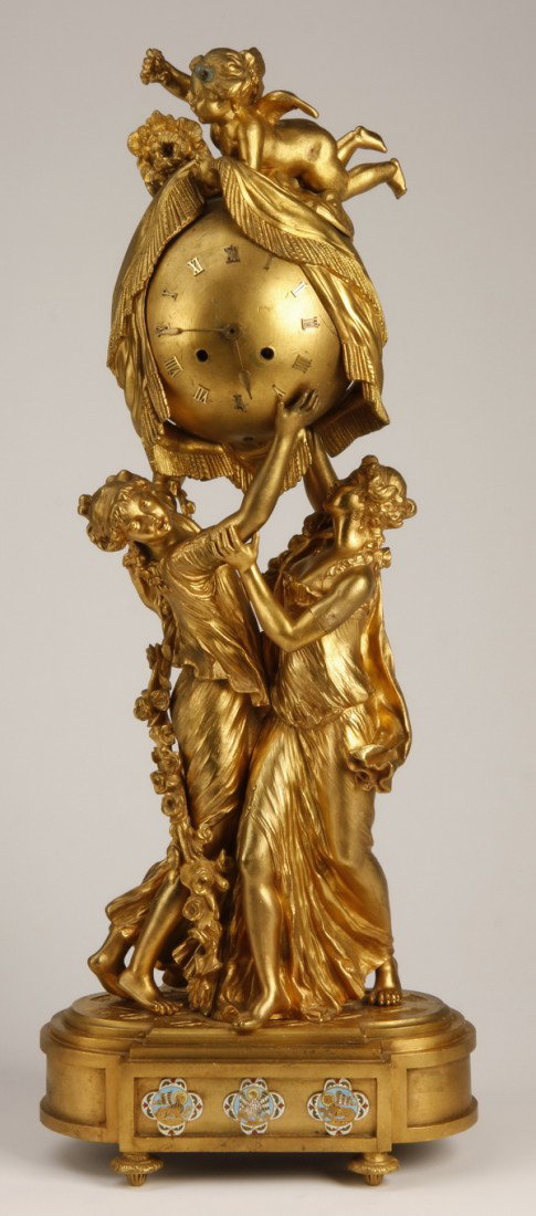 19th c. French dore' bronze figural clock: 19th century Napoleon III dore' bronze figural clock in the form of two maidens with extended arms supporting a drapery covered sphere shaped clock with a winged putto perched atop, the base with thre