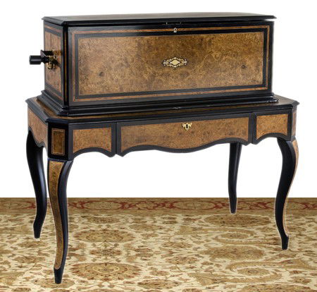 19th c. restored Swiss cylinder music box: Rare and unusual 19th century fully restored Swiss cylinder music box with orchestreon organ in a satinwood and ebonized case with brass and mother-of-pearl inlays on matching table-style stand. Stand