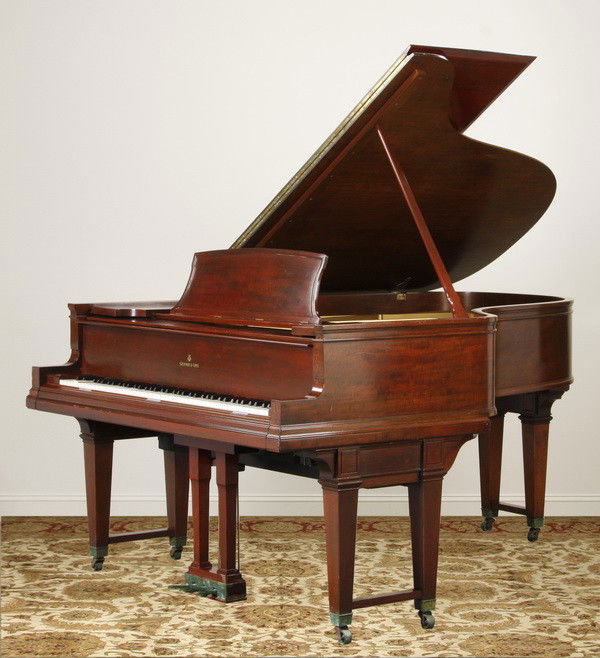 20th c. Steinway & Sons player piano: 20th century American mahogany Steinway & Sons Aeolian Duo Art Reproducing Player Piano with matching lift-top bench and 15 Duo Art music rolls, 82"l x 60"w.