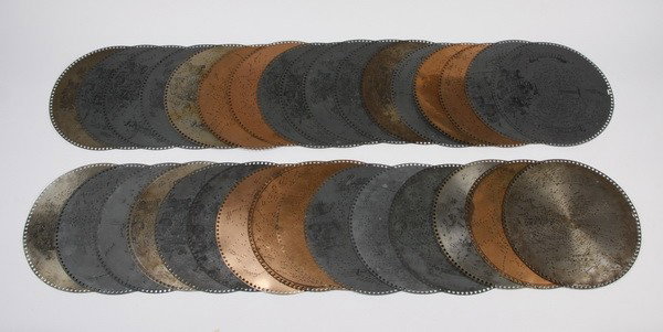 (32) Assorted 15.5" music discs: Group of (32) 15.5" music discs. (1) Little Alabama Coon; (2) Only a Pansy Blossom; (3) Scotch Lassie Jean; (4) Linger, Longer, Loo; (5) The Honeymoon March; (6) When It's Apple Blossom Time in Norman