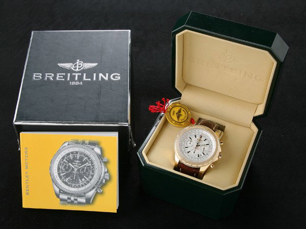 Breitling Bentley 18kt gold chronograph: Breitling Bentley Chronograph, 18kt yellow gold with brown croc leather band, box and papers, serial # 781955.