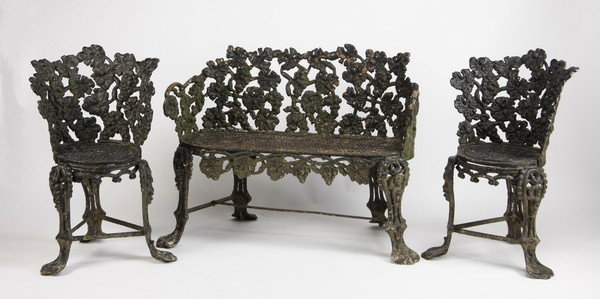 19th c. cast iron patio set, attr'd to Fiske: 19th century American 3-piece cast iron patio set attributed to J. W. Fiske, NY, side chairs 32"h x 20"w x 17"d, settee 31"h x 41"w x 17"d.