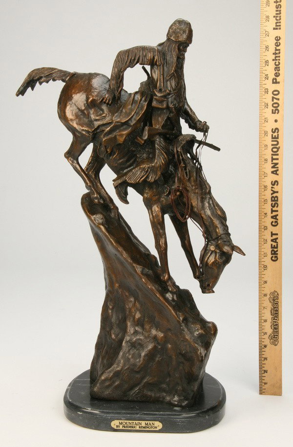 Bronze sculpture, after Frederick Remington: Bronze sculpture titled "Mountain Man" after the original by Frederick Remington, on verde marble base, 28"h.