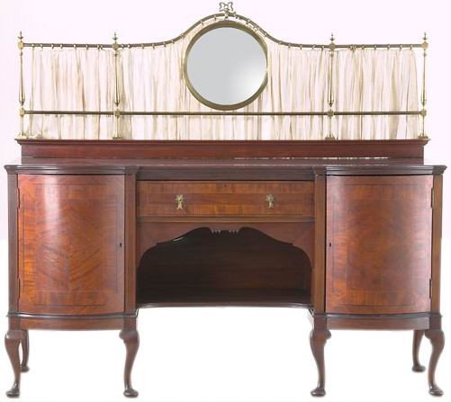19th c. English mahogany buffet: 19th century English Queen Anne-style mahogany inlaid buffet with a double bombe' front and arch top brass gallery supporting a bull's eye mirror, 66"h x 72"w x 27"d.